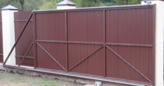 Купить откатные ворота из профнастила Мценск, цена от 1760 руб.